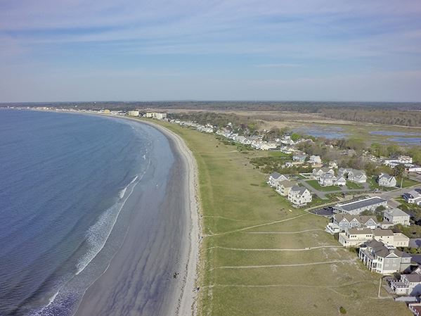 Of the three houses nearest center, the home is on the right. Photo Courtesy of Seawolf Creative