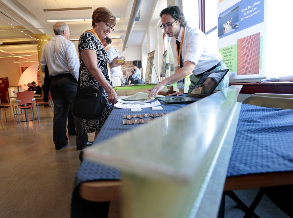 Susan Hodder of Comprend Consulting talks with Benjamin Brown of The Maine Composites Alliance at
a Maine Startup & Create Week "mixpo" in 2016. For 2018, the event has been renamed and refocused.