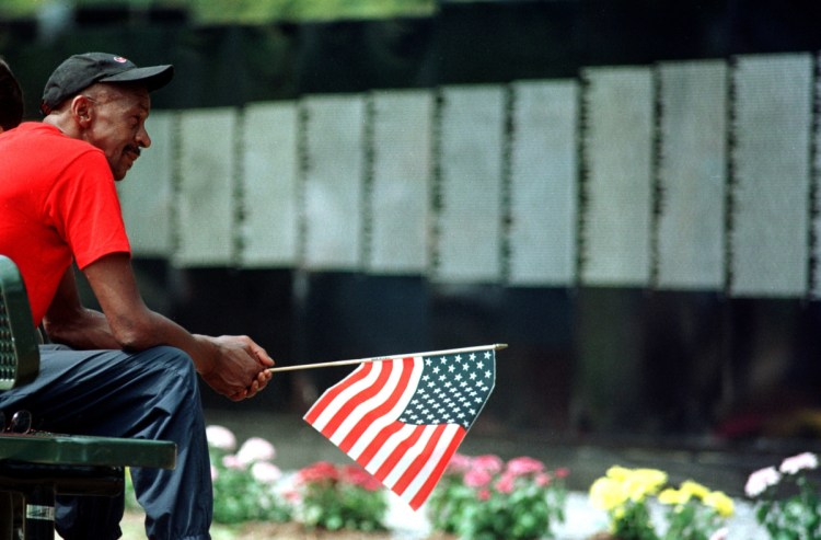 The virtual Wall of Faces project has for nearly 20 years tried to collect a photo to match each of the names on the Vietnam Veterans Memorial Wall in Washington, D.C. The project today is near completion.