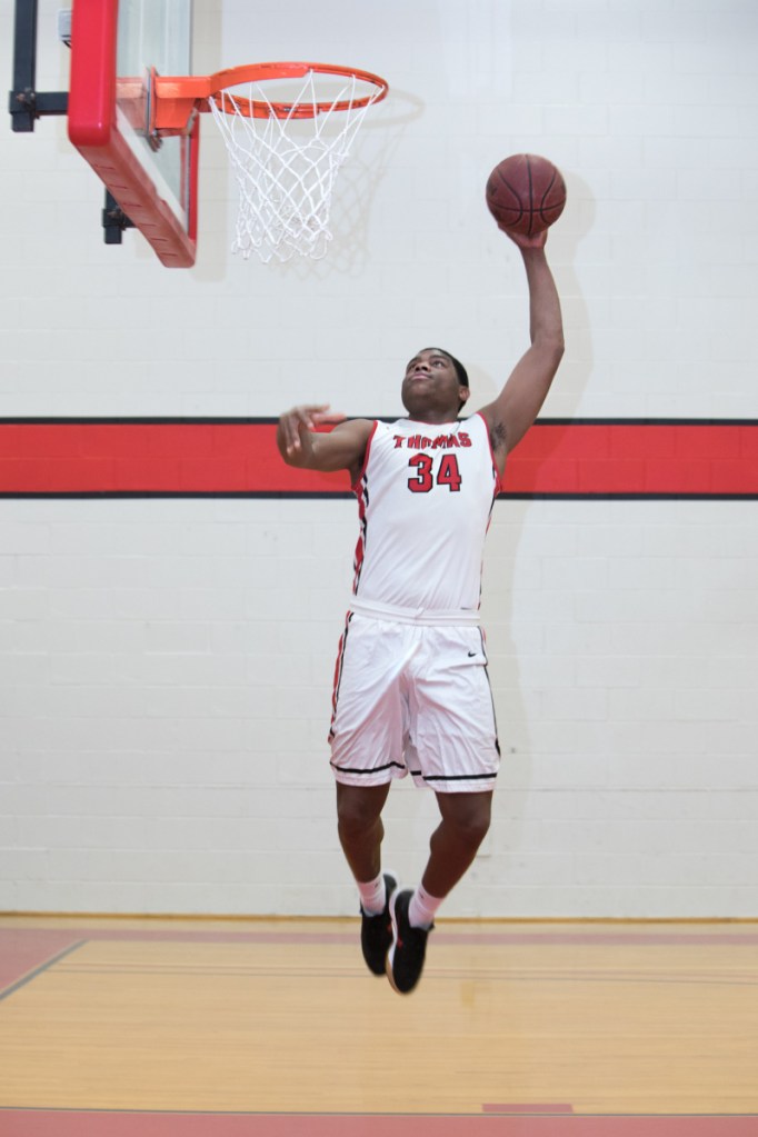 Carlos Gonzalez shooting around in the Larry Mahaney Gym at Thomas College on Monday afternoon.