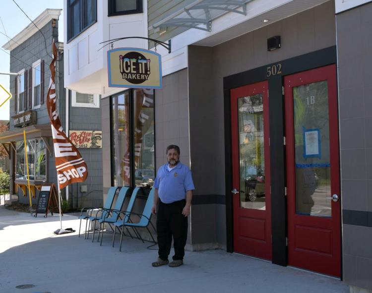 Ice It! co-owner Alan Fried stands outside the Deering Center bakery location in Portland in May.