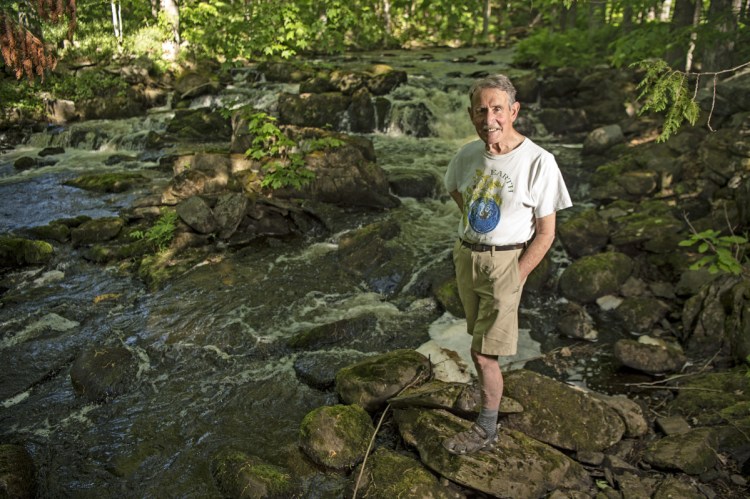 Peter Garrett at Pattee Pond Brook, near his Winslow home.