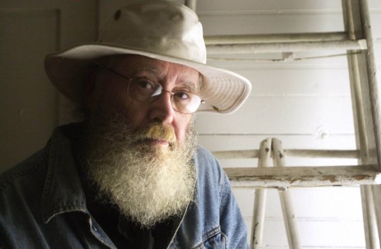 Artist Robert Indiana is shown in one of his studios on Vinalhaven in 2002.