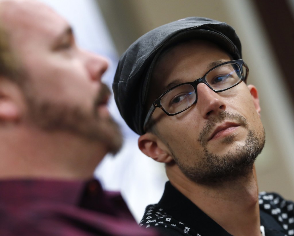 Charlie Craig, left, and Dave Mullins complained after a suburban Denver baker refused to create a cake for them.