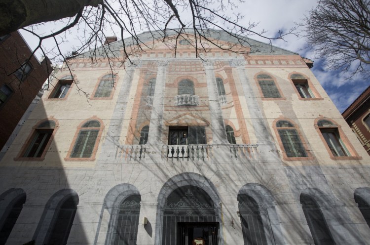 The trompe l'oeil mural overlooking Tommy's Park is a casualty of building renovation at 80 Exchange St. in Portland.  The building's owner wants to replace it, and is looking for just the right idea.