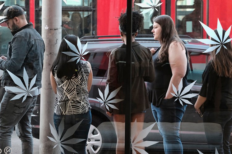 Customers line up for recreational marijuana outside of  a dispensary in West Hollywood, Calif. in January.