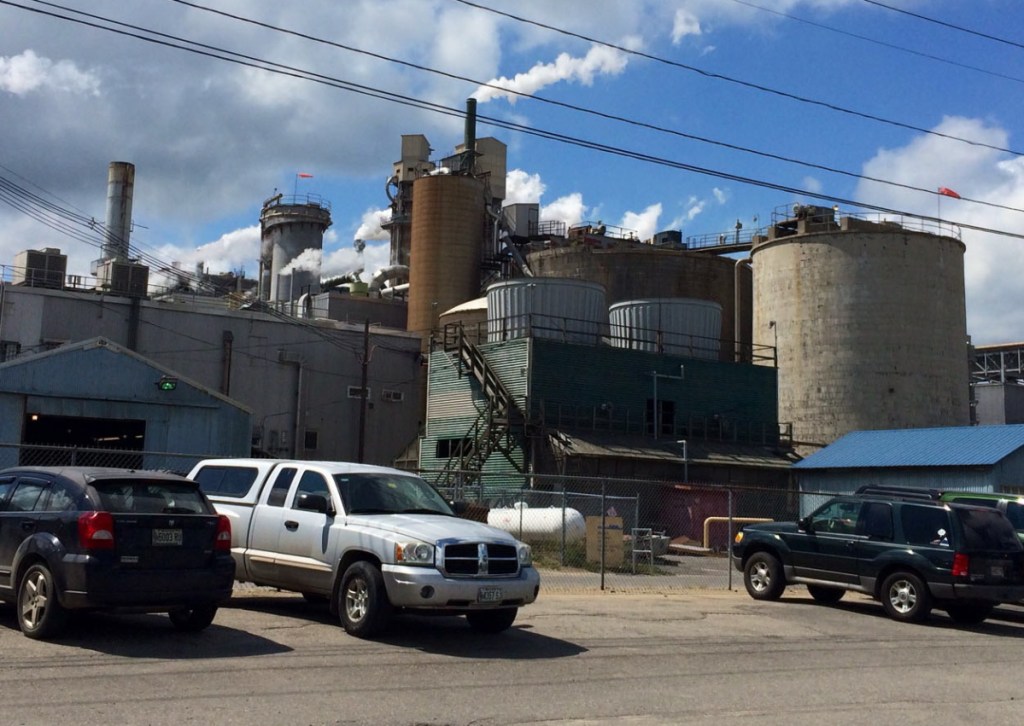 Workers' cars line the parking lot of the Verso mill in Jay. Sen. Susan Collins expects a $42 million payoff to Verso from tariffs collected from Canadian companies will be used for investment.