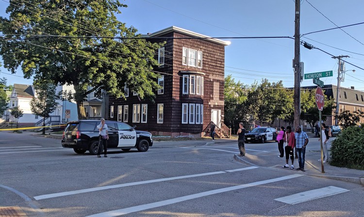 Police respond to Walnut and Horton streets in Lewiston on Friday night after several gunshots were fired in the area.