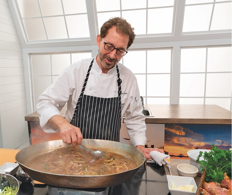 David Turin, a member of Hannaford Chef’s Table, teaches Cooking Matters classes for single mothers in recovery.  (Photo courtesy Hannaford)
