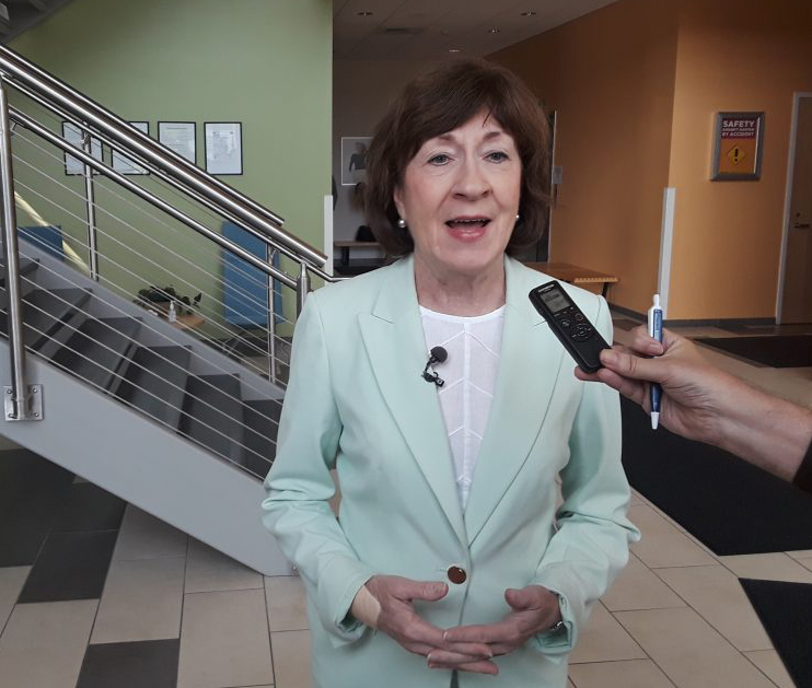 Sen. Susan Collins, R-Maine, speaks to reporters after a tour of Mölnlycke Health Care’s manufacturing facility at Brunswick Landing. 