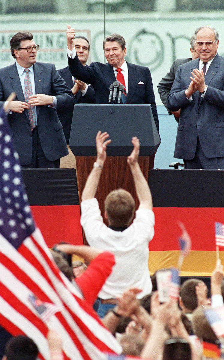 President Reagan speaks on June 12, 1987, in West Berlin, where he said, "Mr. Gorbachev, tear down this wall!" A writer wishes we'd revisit an era when all Americans took pride in their shared values.