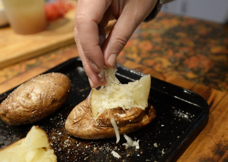 This recipe for Cheesy Bacon and Bean Jacket Potatoes serves four.