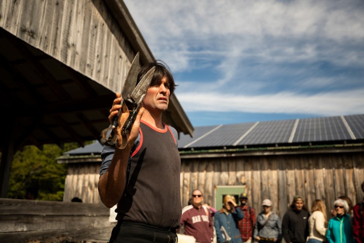 Jeff Burchstead holds a pair of manual shears Saturday morning during his sheep-shearing demonstration at the Common Ground Country Fair in Unity. Burchstead believes he's one of only six or seven professional shearers in Maine.