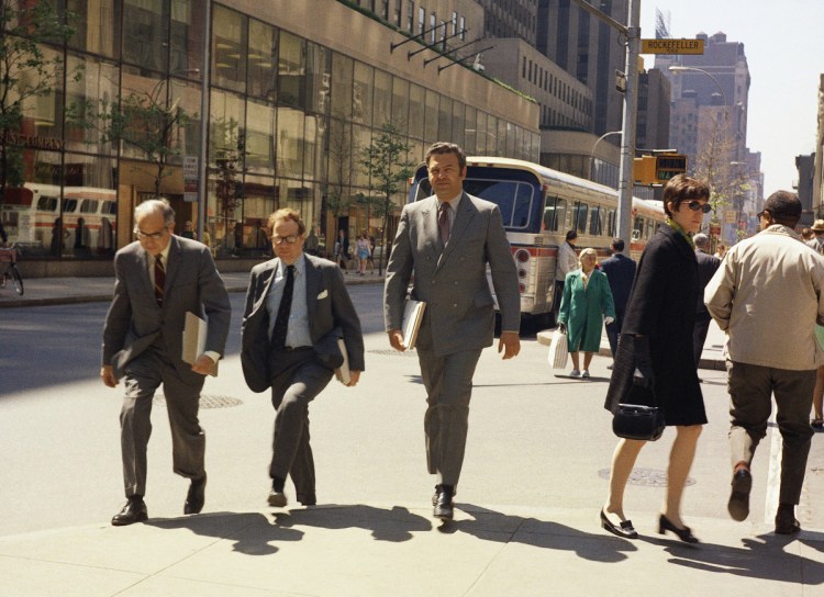 Rockefeller Plaza buzzes at lunch hour in New York in this file photo from May 29, 1969. The government reported Friday that the jobless rate is at its lowest level since the 3.5 percent it reached 49 years ago. And the strength looks likely to endure. There are a record number of open jobs, consumers are confident and economic growth has been brisk.