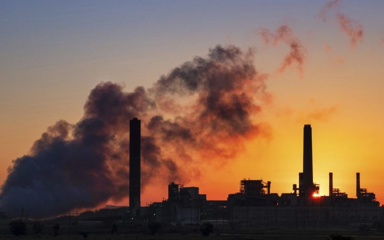 If we are going to avoid the consequences of greenhouse gas emissions, we will need to phase out coal-burning plants like this one in Wyoming.