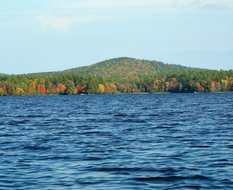 An amazing view looking north to Oak Hill in Fayette from Pocasset Lake. Oak Hill just rises out of the forest. Michael Perry photo