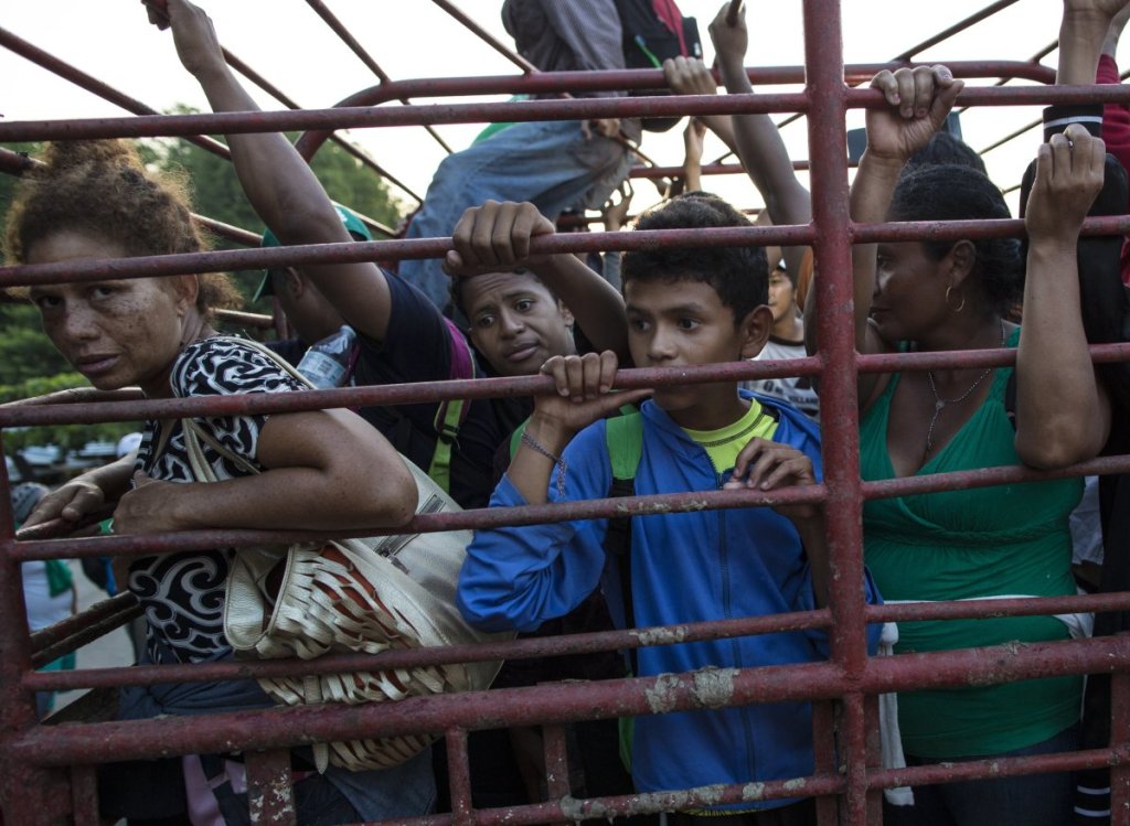 Migrants travel on a cattle truck Friday in Mexico, as a thousands-strong caravan of Central American migrants slowly makes its way toward the U.S. border.
Associated Press/Rodrigo Abd