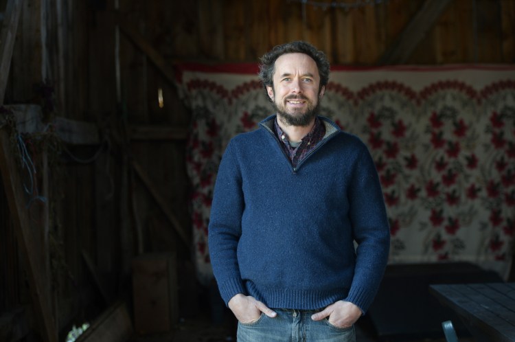 Jonah Fertig-Burd, whose life is devoted to bringing people together through cooperative work, at his Durham Tree Farm Thursday, November 8, 2018.