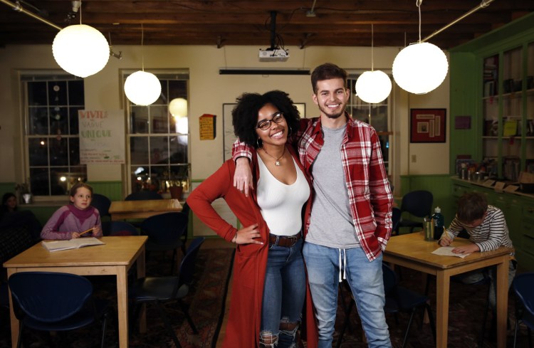 Gracia Bareti, left, and Salar Salim are two of the 50 people from the Telling Room writing center who plan to go to Boston on Saturday to hear former first lady Michelle Obama speak as part of her national book tour for "Becoming."