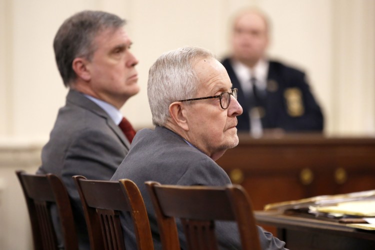 Ronald Paquin listens to testimony in York County Superior Court on Monday, the first day of his trial on charges that he sexually abused two boys on trips to Maine in the 1980s. On Tuesday, one of Paquin's accusers told the jury that the abuse began when he was 8 or 9 years old.