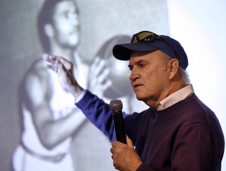 Local author Phil Hoose talks about his new book "Attucks! Oscar Robertson and the Basketball Team That Awakened a City" during a presentation on Wednesday at Portland Public Library.