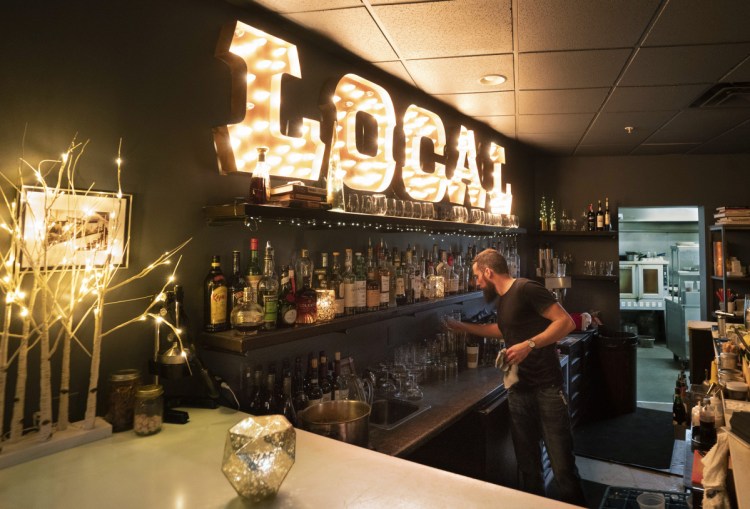 Bar manager Mat Garofalo works the bar at 50 Local in Kennebunk. Garofalo is responsible for many of the restaurant's unique cocktails.