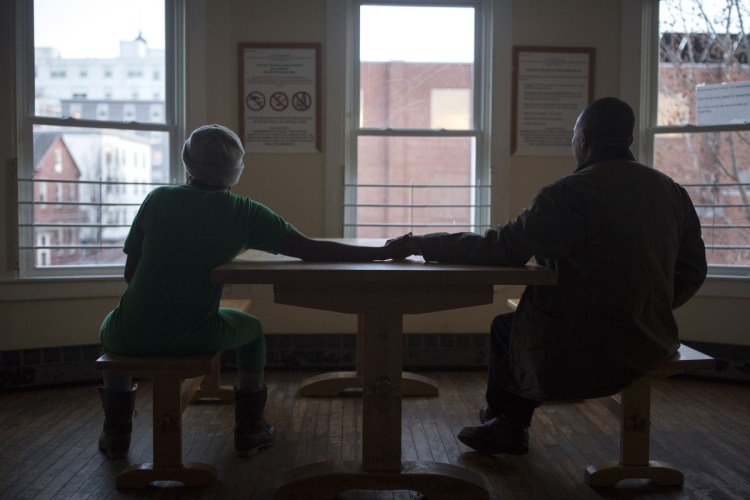 Matare and his wife at the family shelter. "We are here today, thanks to God," he says. "I'd rather be in the cold weather than stay in Angola, and any time a bullet would go through my head." 