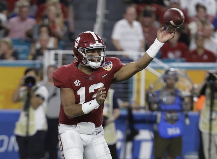 Alabama quarterback Tua Tagovailoa looks to pass during the first half of Saturday's game against Oklahoma.