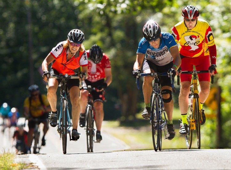 Cyclists participate in the 2015 version of BikeMaine. Organizers say the event has a substantial economic impact on the state. 