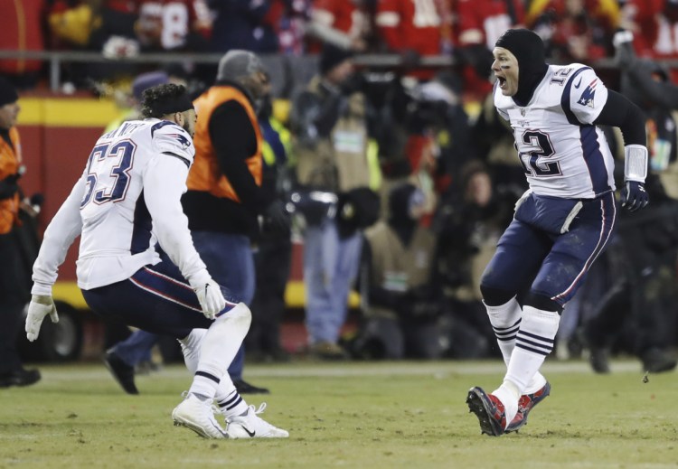 Tom Brady celebrates with middle linebacker Kyle Van Noy after the Patriots scored the winning touchdown in the AFC Championship game Sunday night in Kansas City.