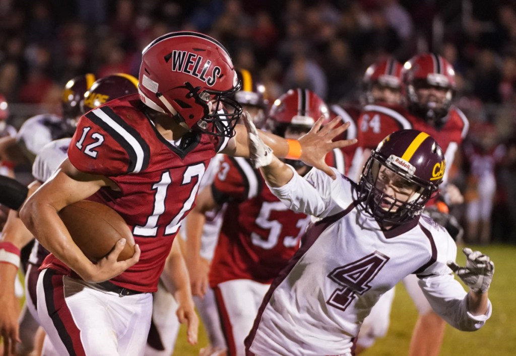 Tyler Bridge of Wells High gained over 3,000 all-purpose yards and set an unofficial state single-season record with 45 touchdowns last fall. (Staff photo by Gregory Rec/Staff Photographer)