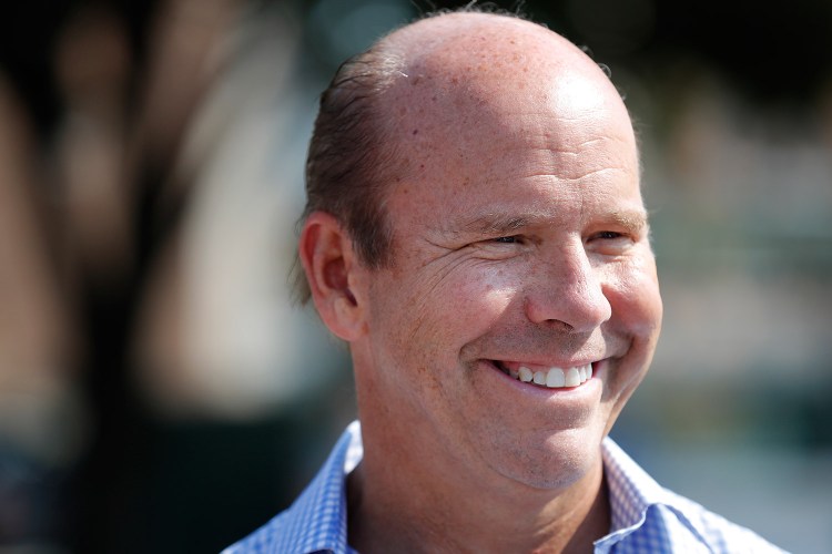 Then-U.S. Rep. John Delaney, D-Md., speaks to fairgoers during a visit to the Iowa State Fair in Des Moines, Iowa, in August 2018. Iowa is home to the first caucus of the 2020 Democratic presidential nominating campaign. 