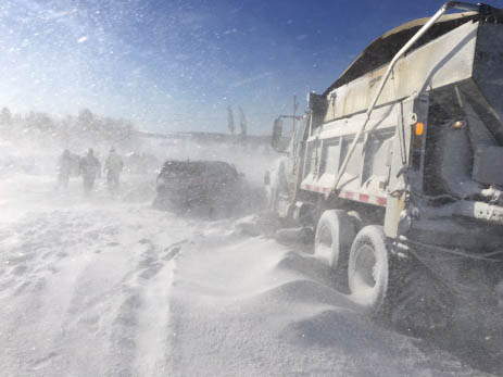 Heavy winds caused whiteout conditions on Route 1 in Cyr Plantation on Tuesday at the scene of an 11-vehicle crash that resulted in several injuries.