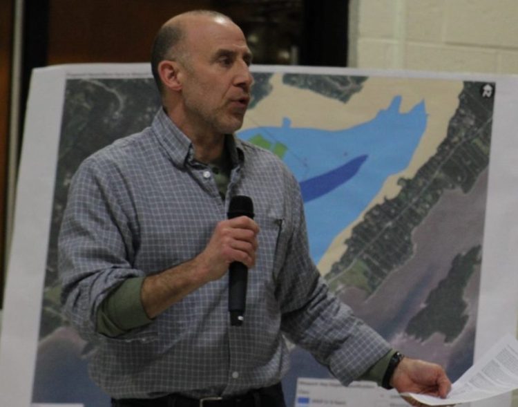 Paul Dioli, a member of the Maquoit Bay Preservation Group, testifies Tuesday at the Department of Marine Resources hearing.