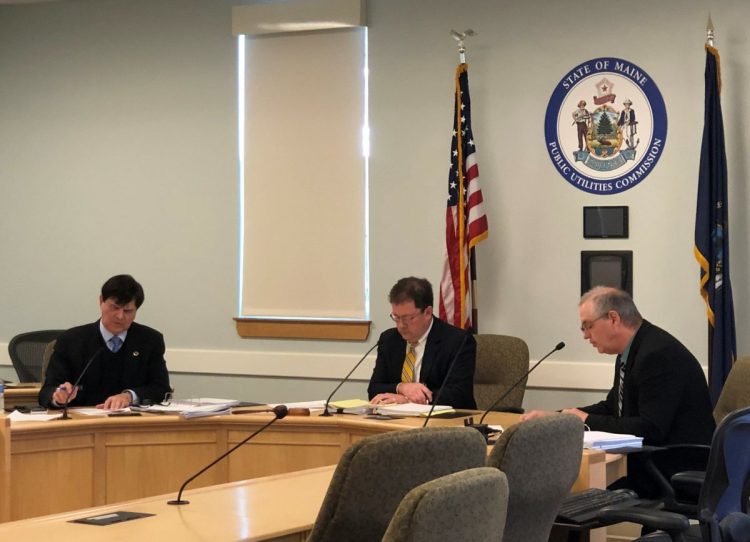 Morning Sentinel photo by Meg Robbins 
 During deliberations in Hallowell on Tuesday morning, Public Utilities Commissioners, from left, R. Bruce Williamson, Mark Vannoy and Randall Davis discuss complaints against Central Maine Power Co. from residents of Jackman, Caratunk and Dover-Foxcroft. 
  
  
 The officials unanimously agreed to open an investigation into the utility's service in the Somerset and Piscataquis county towns.