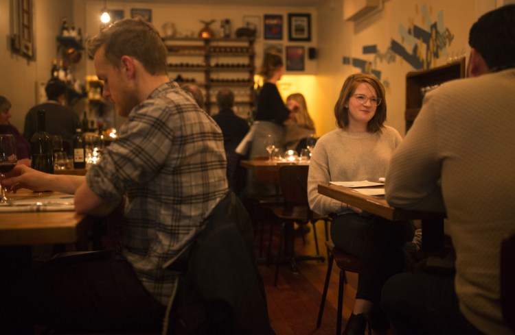 Susannah Gleason, right, dines at Piccolo with her friend Daniel Rios on Feb. 28.