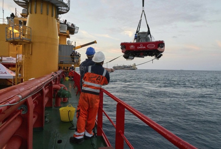 A submersible is launched from the Ocean Zephyr on Thursday.