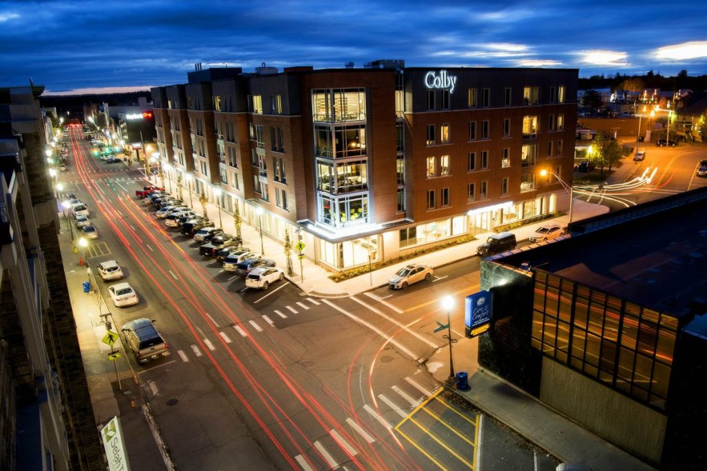 The Joan and Bill Alfond Main Street Commons building lights up Main Street in downtown Waterville on Oct. 30, 2018.