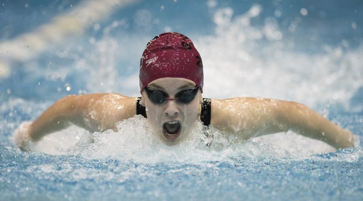 Olivia Tighe has led Cape Elizabeth to three straight Class B state titles, setting two individual state records and three relay state records.