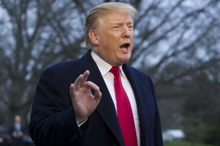 President Trump speaks with reporters Sunday after stepping off Marine One on the South Lawn of the White House following his return from Florida. Trump described special counsel Robert Mueller's investigation as "an illegal takedown that failed."