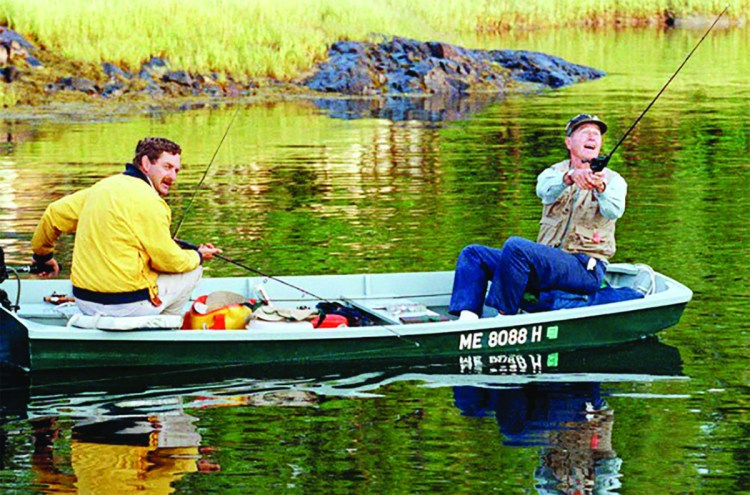 Then-President George H.W. Bush fishes on the Kennebunk River in Maine on Aug. 27, 1990. The late president will soon be a member of the fishing hall of fame.