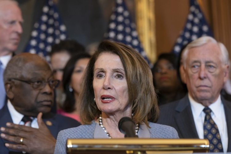 Speaker of the House Nancy Pelosi, D-Calif., announces legislation to lower health care costs and protect people with pre-existing medical conditions at the Capitol on Tuesday. The Democratic action comes after the Trump administration told a federal appeals court that the entire Affordable Care Act, known as "Obamacare," should be struck down as unconstitutional.