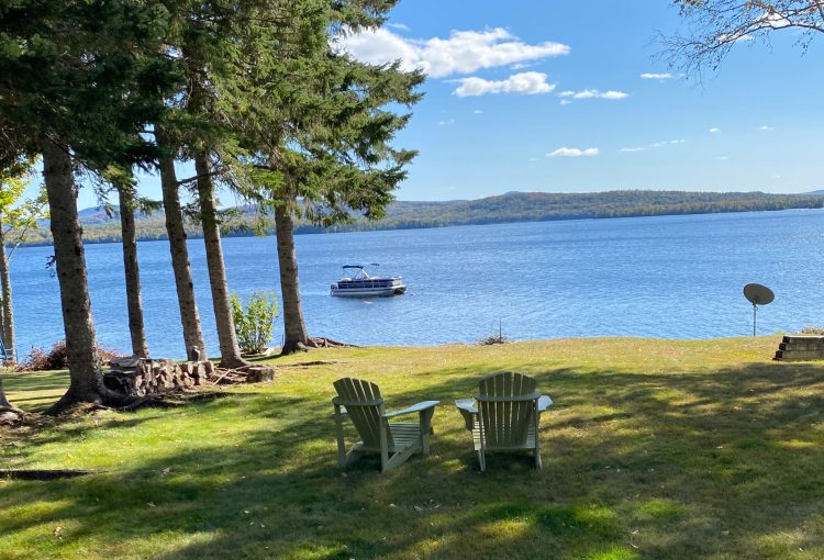 The home
is tucked on Smith Cove, looking at the sunrise over
Saddleback Mountain. Loons, eagles, salmon, trout
and smallmouth bass are natural neighbors.