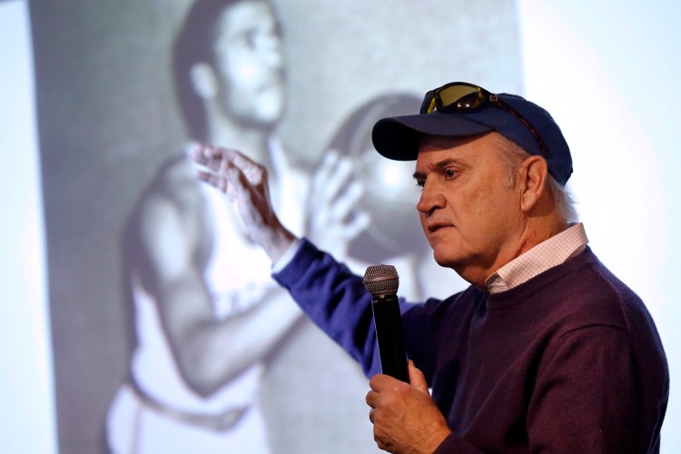 Phillip Hoose gives a talk at the Portland Public Library in 2018.