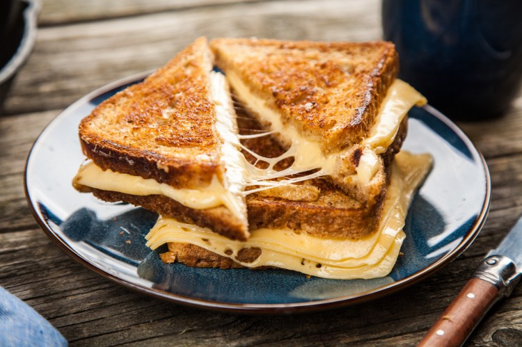 "There are a few absolute, ironclad rules that I think protect us from losing our tenuous hold on civilization and sliding into the chaotic abyss, and one of them is this: Sandwiches must be cut in half on the diagonal." So says Washington Post writer Emily Heil. And never more so than when the sandwich is grilled cheese. 