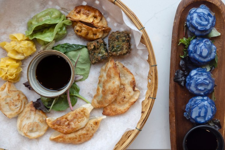 The dumpling flight, left, and the gluten-free blossom dumplings at Dok Mali.